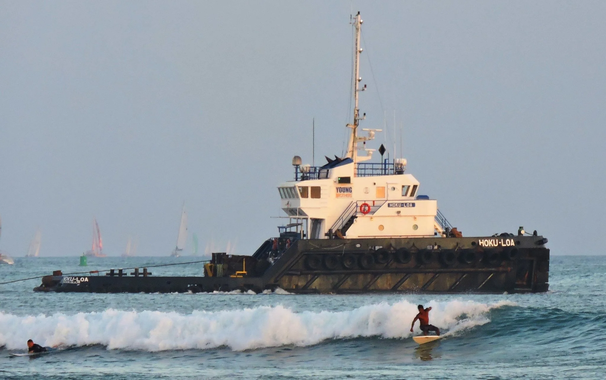 Young Brothers tug in the surf.jpg