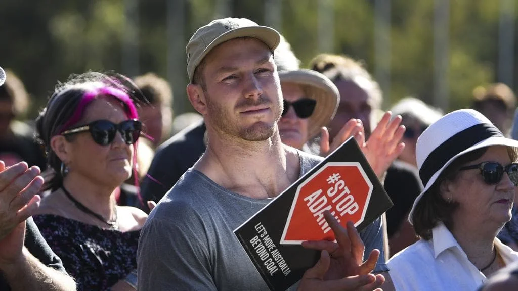 David Pocock attends a protest outside Parliament House in Canberra in February against the proposed Adani coal mine. Picture: AAP