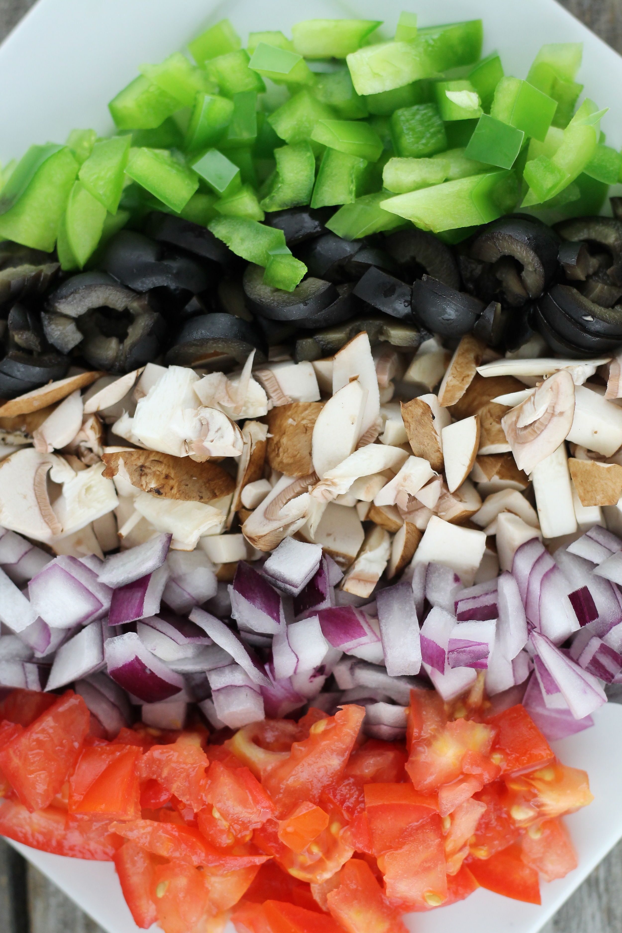 Tomatoes, Green Peppers, Onions, Mushrooms, Black Olives
