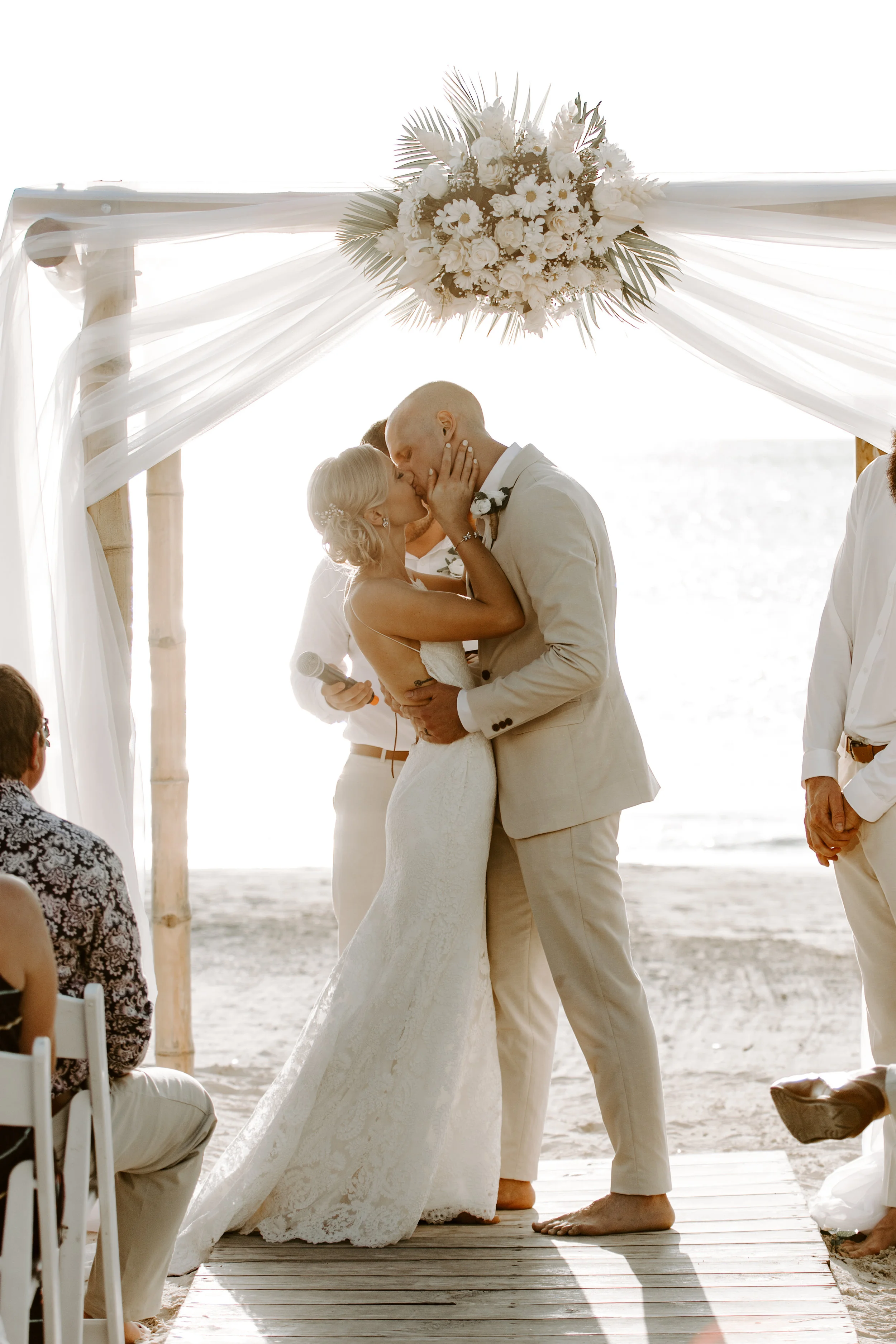 beach wedding, beach wedding ceremony, i do, bride and groom, beach wedding dress, first kiss, backless wedding dress, backless dress, katie may, katie may bridal, destination wedding, jamaican wedding, define fettle