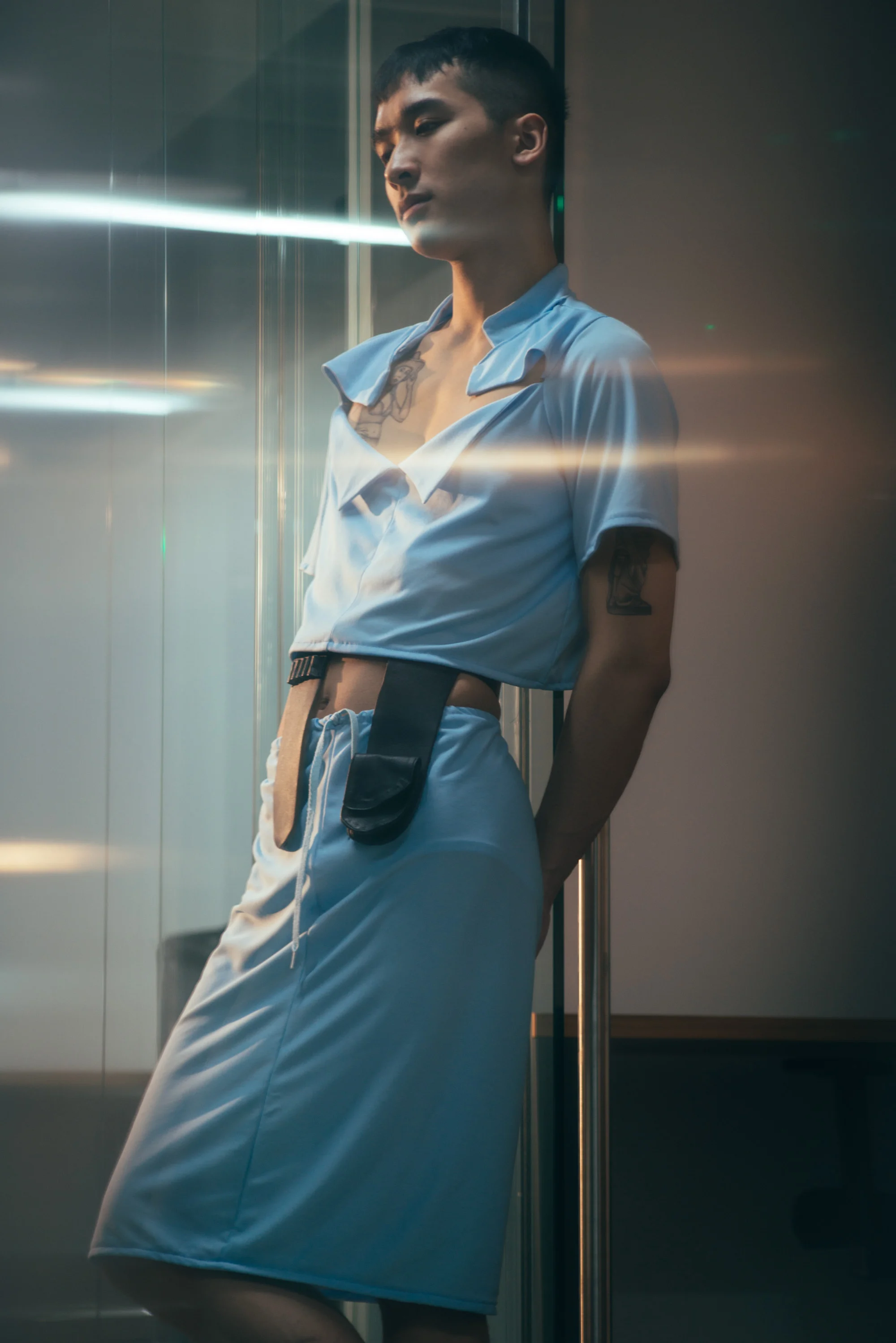 Franky wears skirt suit Keith LaFuente, belt Nat Carlson.