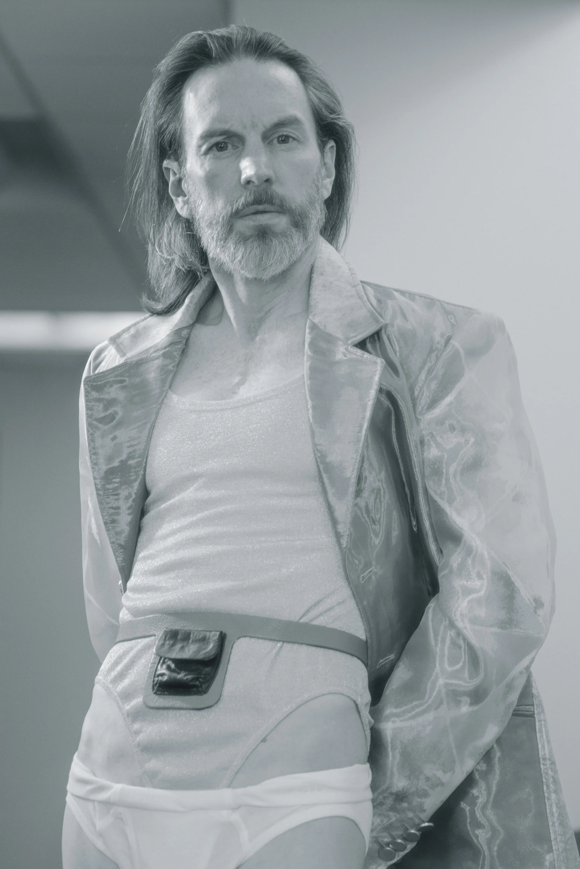 Timothy wears coat Vasilis Loizides, vintage DKNY bodysuit James Veloria, belt Nat Carlson and underwear Hanes.