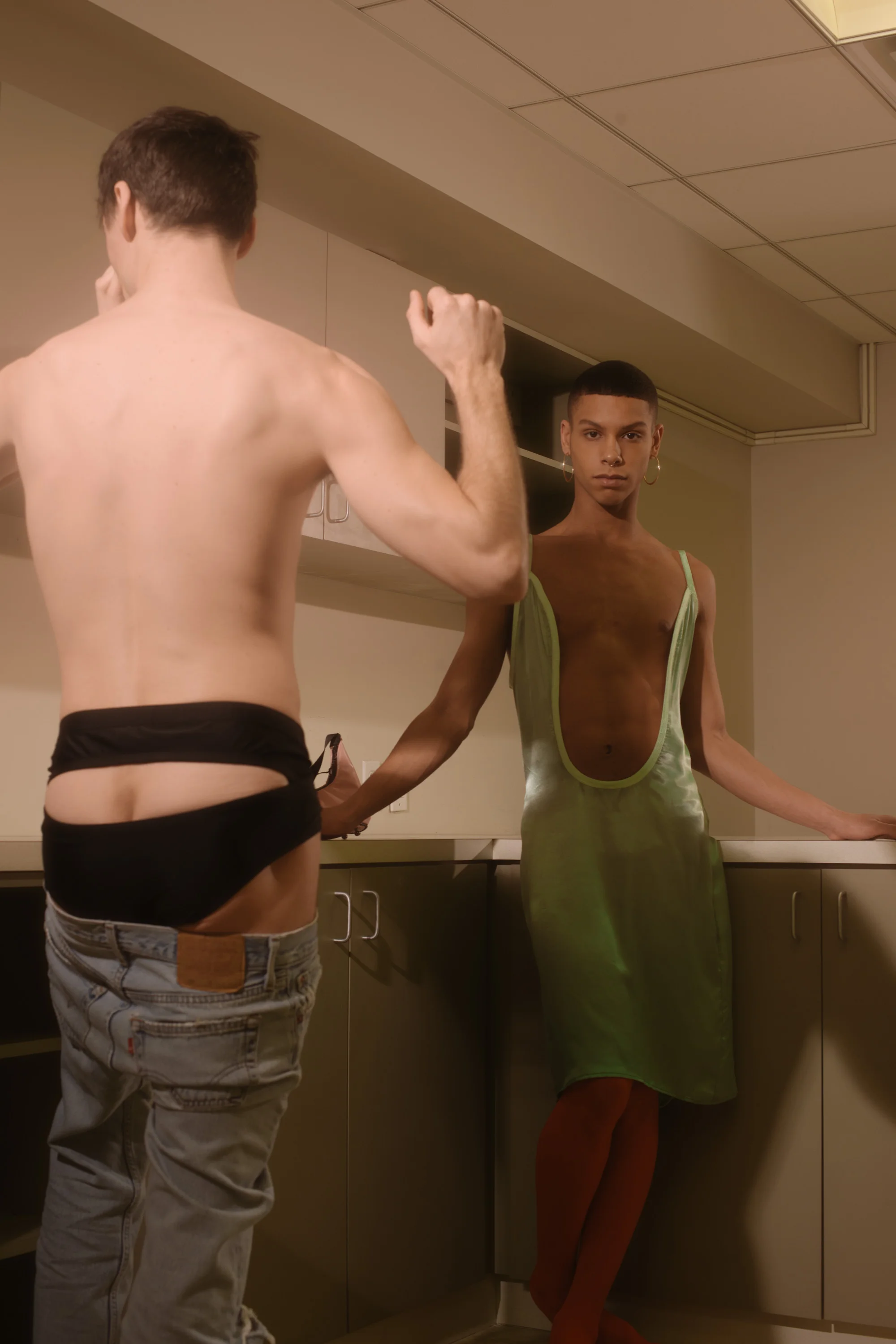 Thomas wears Telfar swimsuit, Anderrson wears dress Vasilis Loizides, tights We Love Colors.