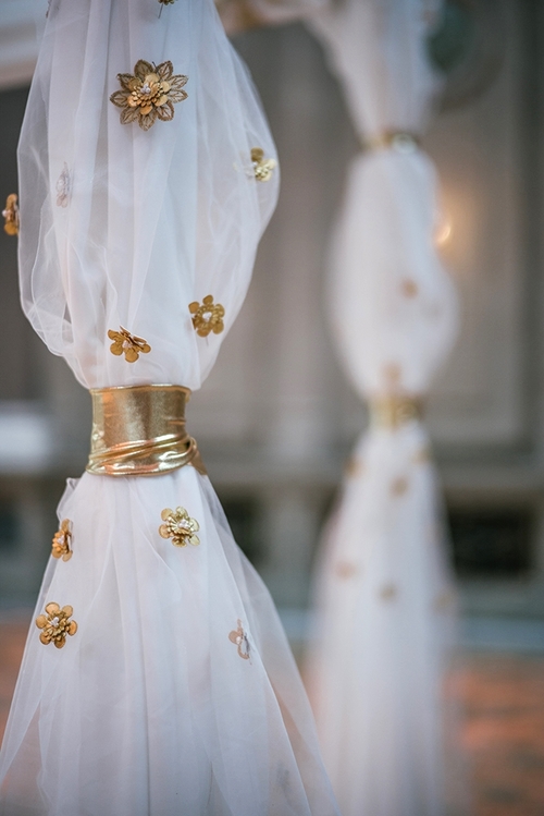 As you get close up, more details come in to view like handpainted gold leather flowers. It is important that the chuppah look great from both close up and far away.