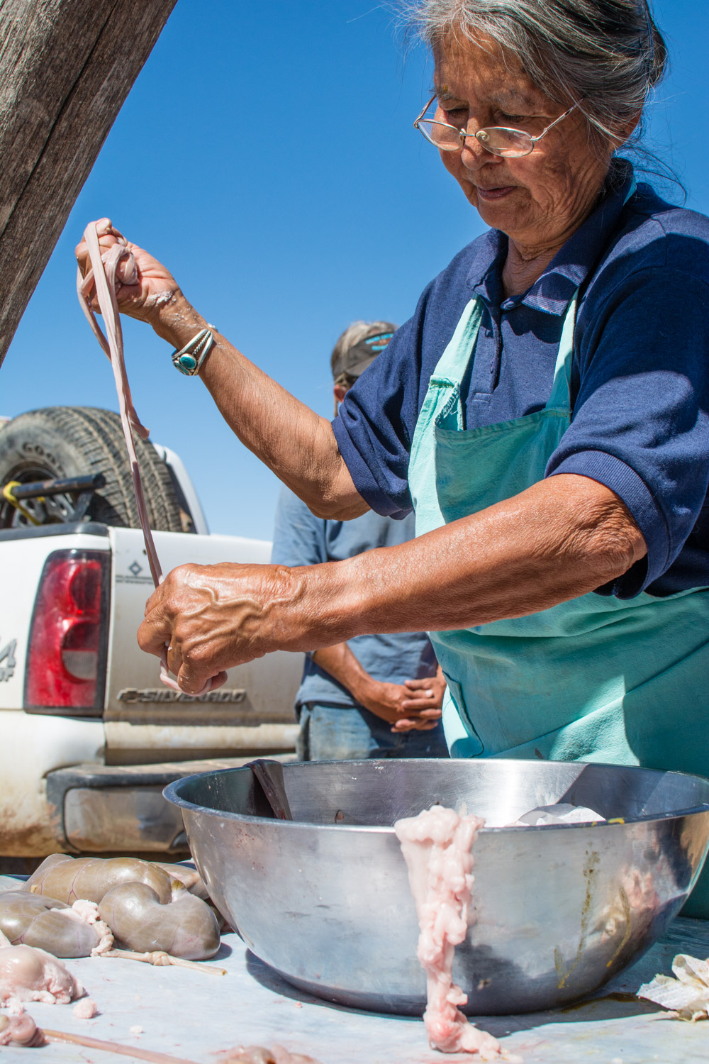 Louise Tso cleans sheep intestines. 