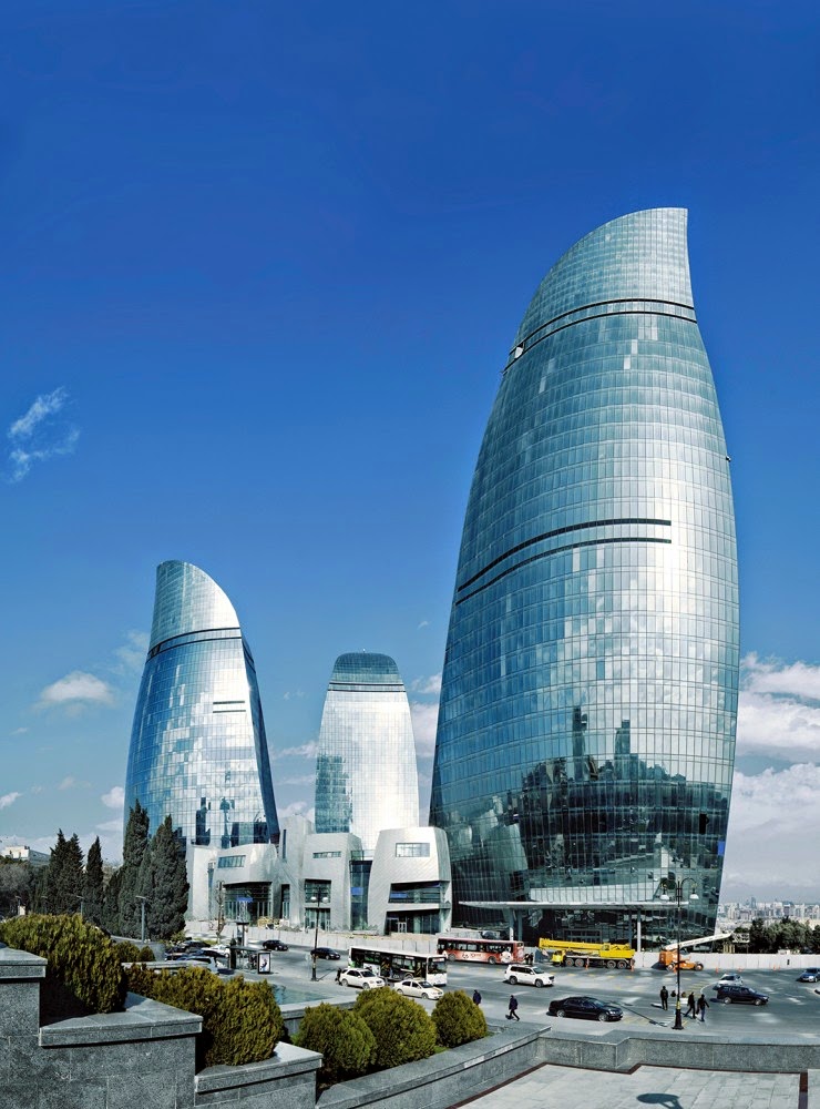53f2d7c0c07a800962000450_baku-flame-towers-hok_portada-740x1000.jpg