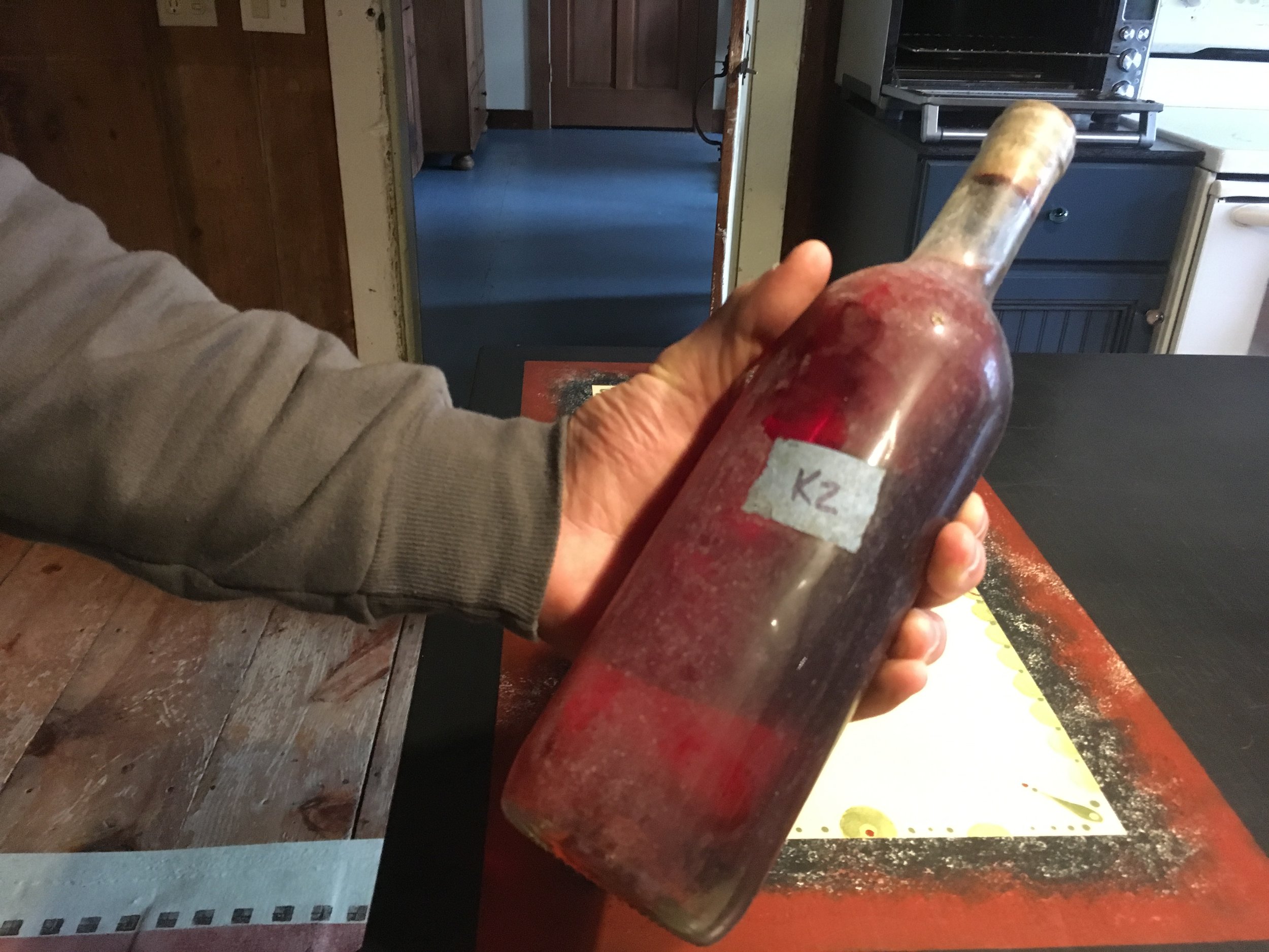A bottle of knotweed wine from Ken's cellar | Photo: Taylor Quimby