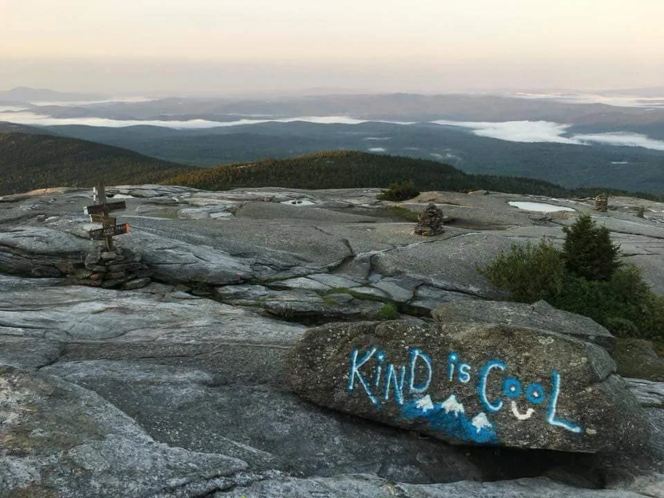Photo courtesy of Doug Brown. On a sunrise hike up New Hampshire’s Mt. Cardigan in August, Doug discovers a kindness boulder and posts it on Facebook.