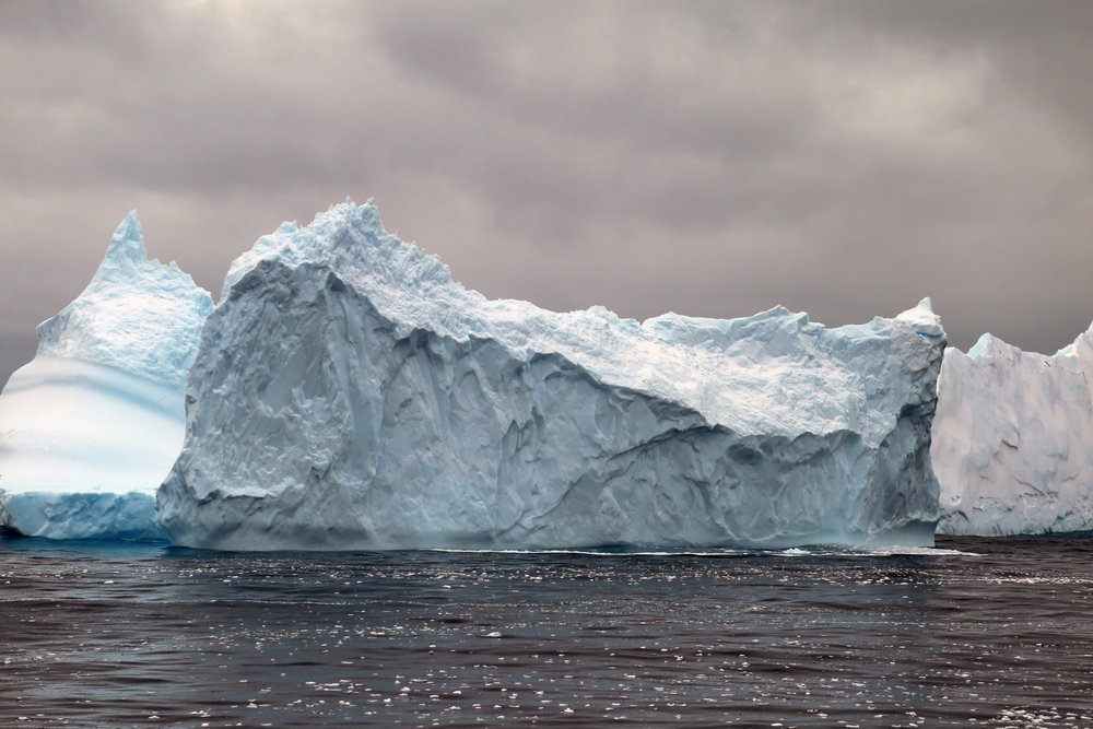  An iceberg in Antarctica, eerily illuminated. Credit Elizabeth Rush. 