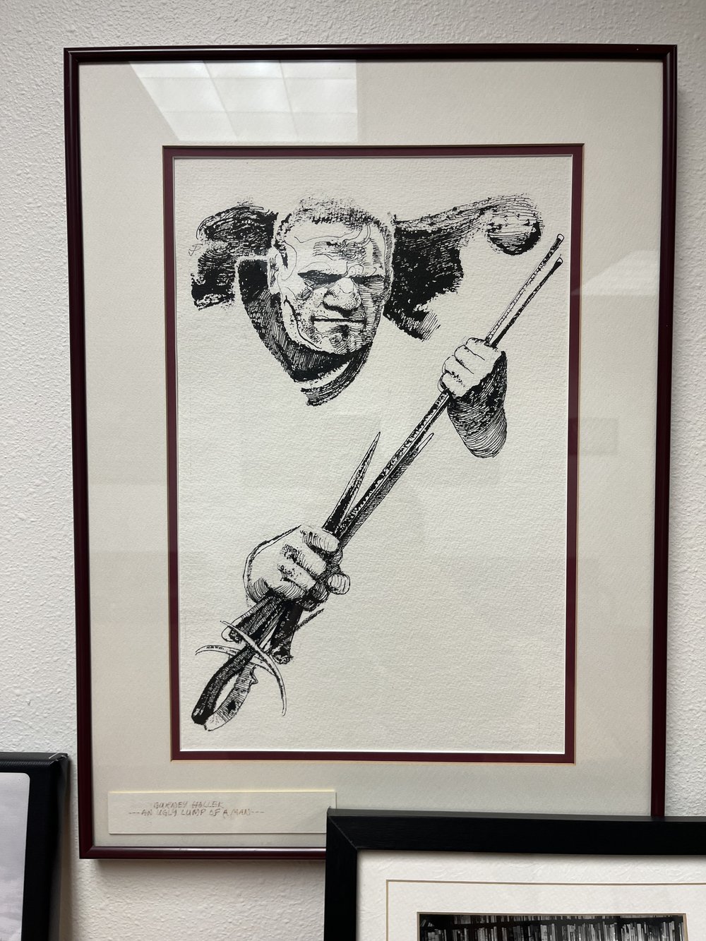 An original illustration of Gurney Halleck on display in the Herbert Room at the Siuslaw Public Library in Florence, Oregon.  Photo by Justine Paradis. 
