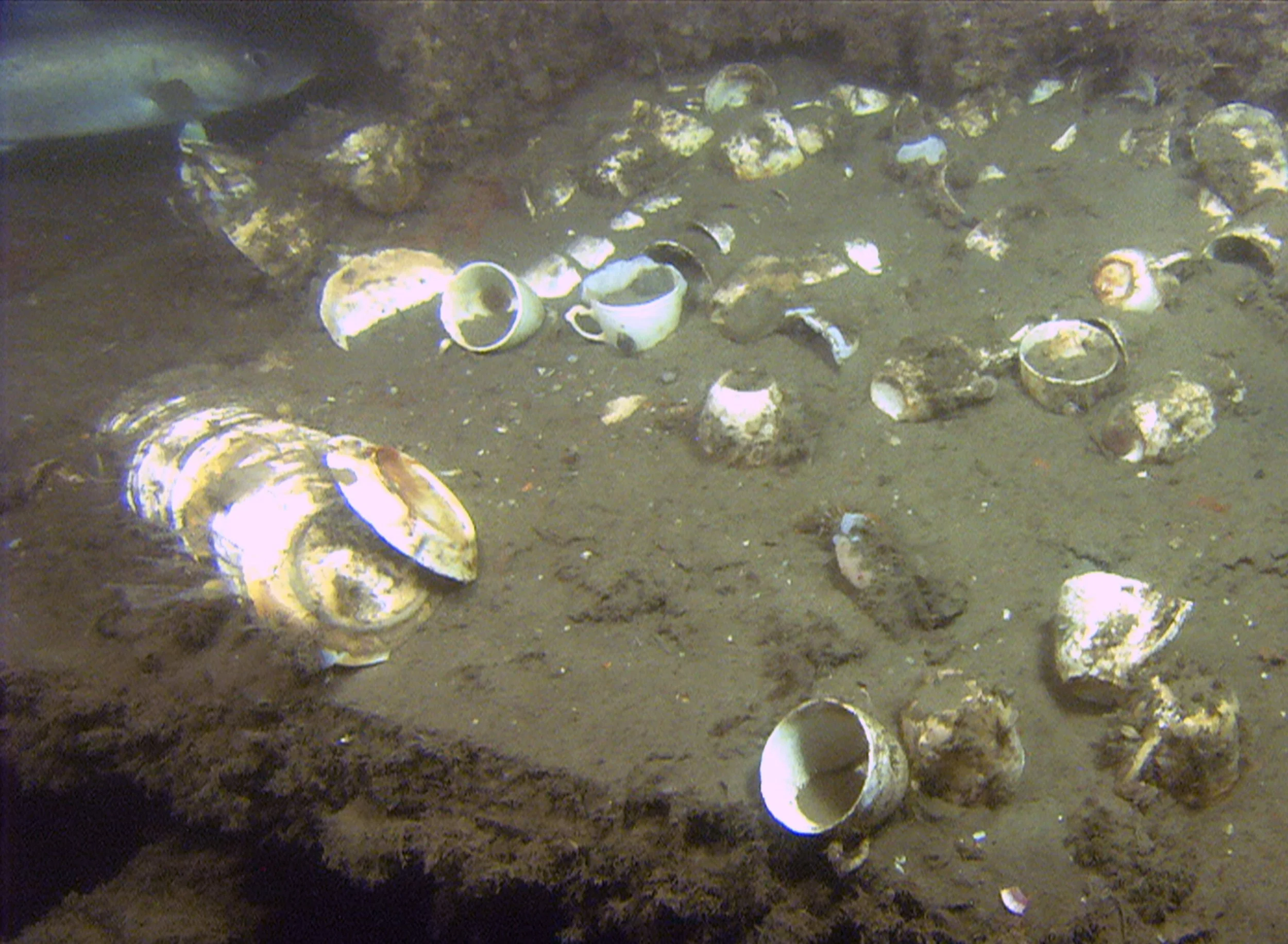 Cups and plates in the steamship Portland 's galley. Photo courtesy of NOAA/SBNMS and NURTEC