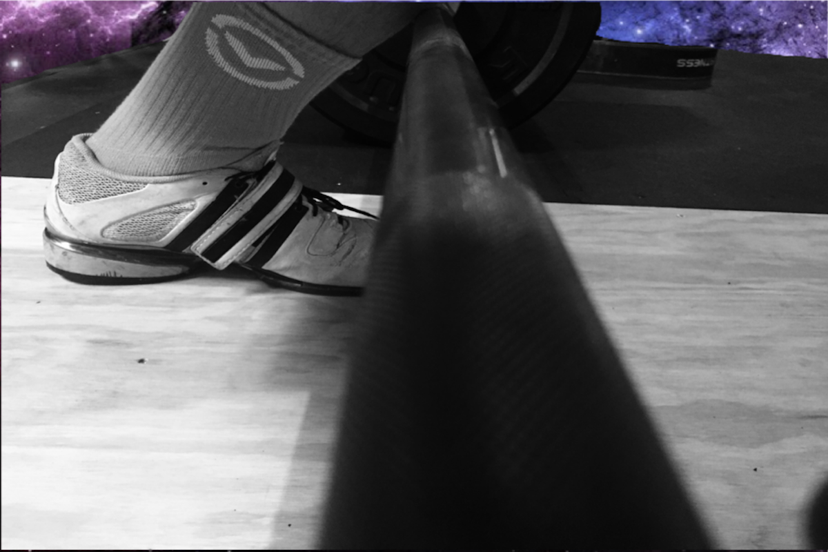 Athlete shoe approaching bar to clean barbel.PNG