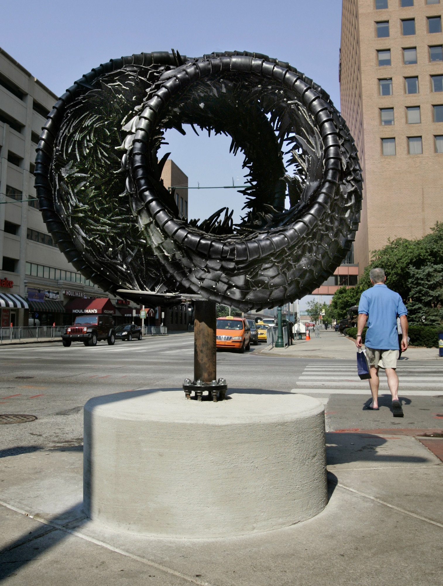 Tailgating, 2008 Rubber tires and stainless steel 4 1/2 x 6 x 3 3/4 feet Location: Northeast corner of Illinois & Maryland streets, near the stadiums