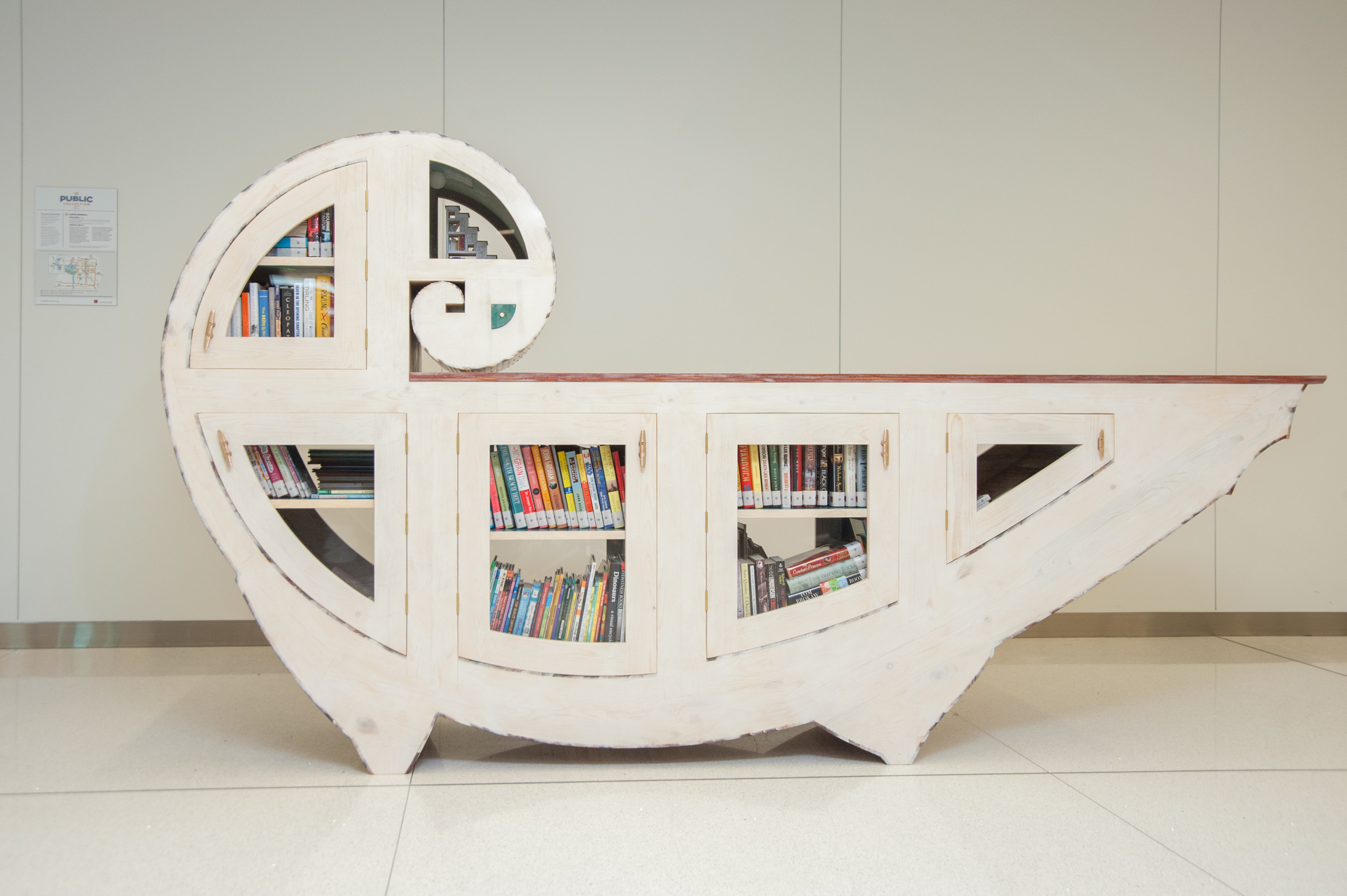  Nautilus, 2015 by Katie Hudnall   Plywood, reclaimed wood, wood, fasteners &amp; hardware, plexiglass, paint, ink, dye, lacquer, wax with two ink on paper drawings framed in wood by the artist Console: 64 x 120 x 24 inches, Drawings: 26 x 36 inches