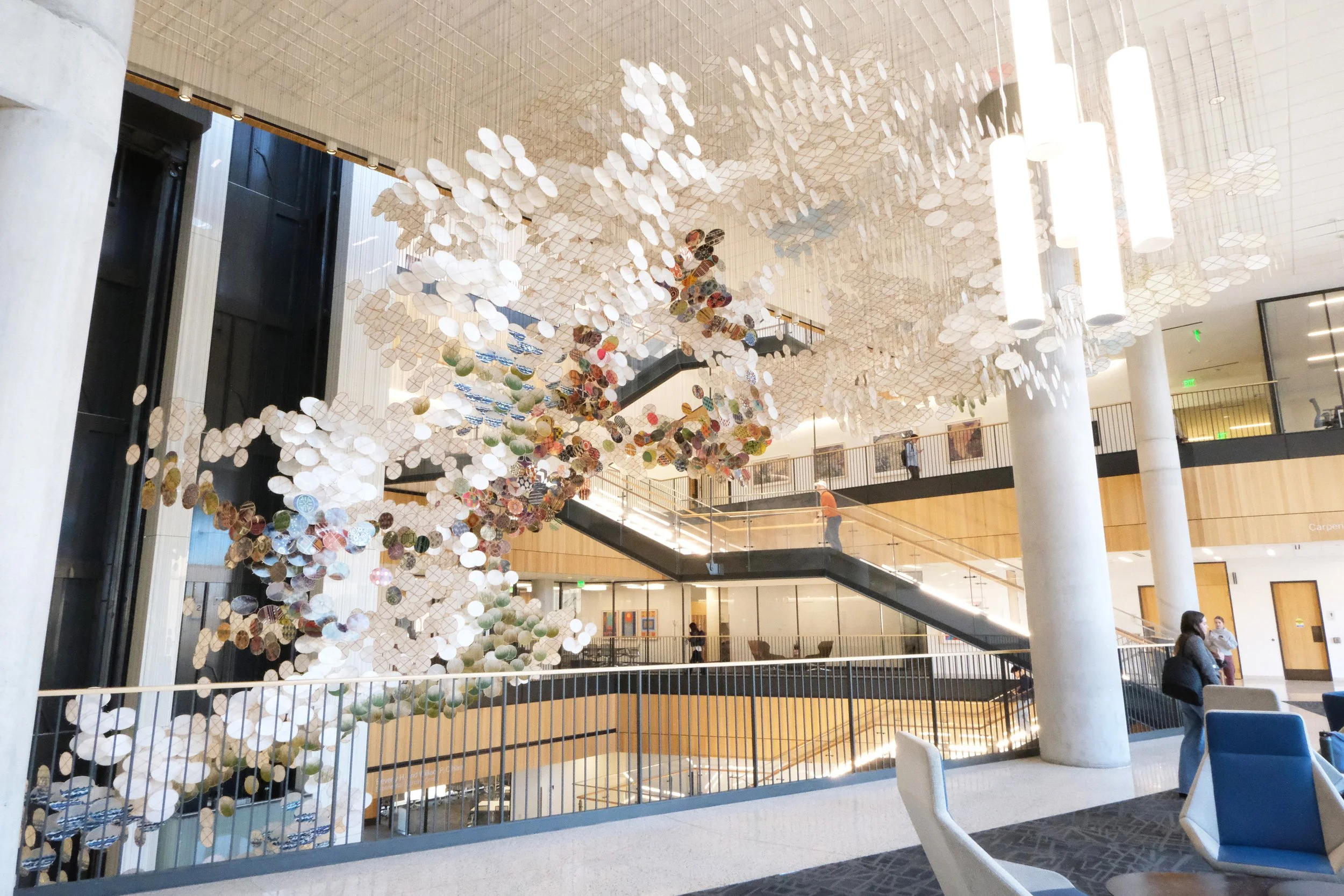   Jacob Hashimoto  (American, b. 1973)   The Wind’s Gathering Applause ,2026 Resin, bamboo, screenprints, UV prints, acrylic, stainless steel, and Spectra 47 x 43 x 36 feet    Jacob Hashimoto is best known for using traditional Japanese methods to cr