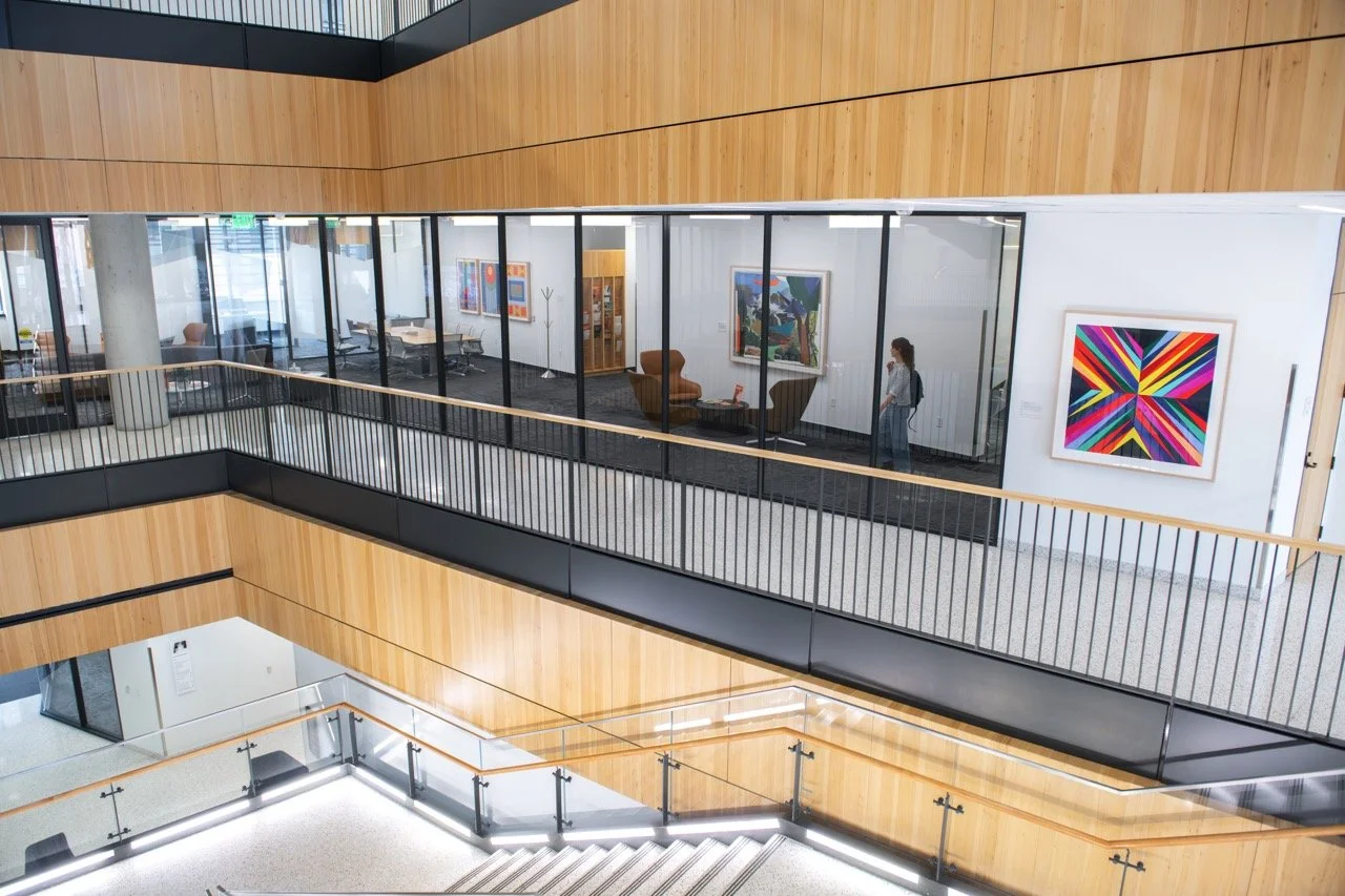   Odili Donald Odita  (Nigerian American, b. 1966)   Black Star,  2024 Silkscreen on Somerset Tub Satin 410 gsm paper Edition of 35 43 1/4 x 43 1/4 inches  View of the MBA office with Odili Donald Odita’s  Black Star  anchoring the wall outside. His 