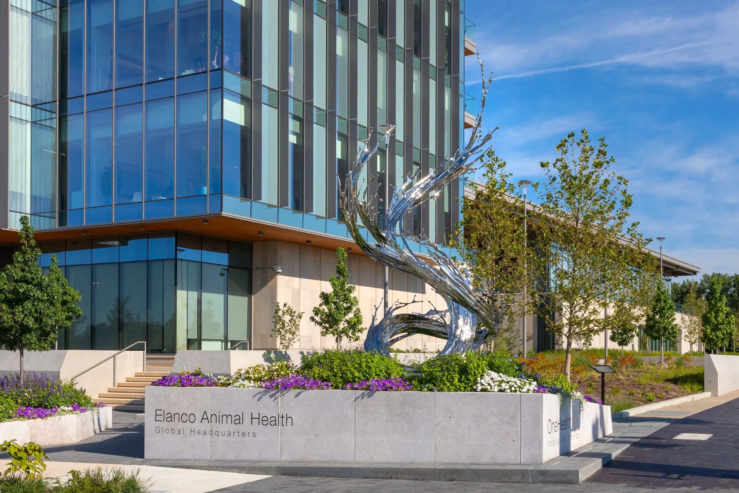  Art Strategies collaborated with our corporate partner, Elanco Animal Health, to select an artwork that honors and represents its new global headquarters and the gateway to the One Health District along the White River.     Water in Dripping, River 