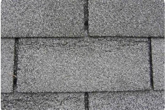  Wind creased shingles, such as this photo, cannot be seen from the ground