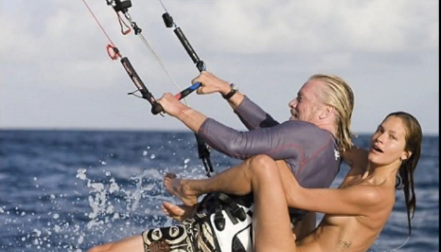 A few days ago I came across this photo of Richard Branson kiting with a be...