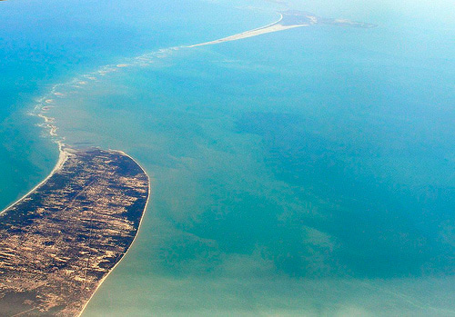 Adam's Bridge, also known as Rama's Bridge or Rama Setu is a chain of limestone shoals, between Pamban Island, also known as Rameswaram Island, off the south-eastern coast of Tamil Nadu, India, and Mannar Island, off the north-western coast of Sri Lanka. Geological evidence suggests that this bridge is a former land connection between India and Sri Lanka.