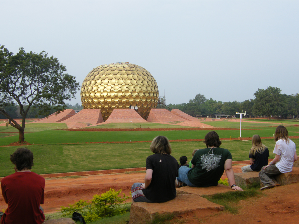 Auroville (City of Dawn) is an experimental township in Viluppuram district mostly in the state of Tamil Nadu, India with some parts in the Union Territory of Puducherry in South India. It was founded in 1968 by Mirra Alfassa (known as "the Mother") and designed by architect Roger Anger. As stated in Alfassa's first public message in 1965, she states, that Auroville is meant to be a universal town where men and women of all countries are able to live in peace and progressive harmony, above all creeds, all politics and all nationalities. The purpose of Auroville is to realise human unity.