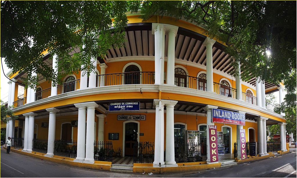 Pondicherry is the largest French colony in India. The city has a long and interesting history of trade and war. There is a strong French influence in the city, especially in the old quarters, with Rues and Boulevards lined with Mediterranean style houses and bakeries, although the city remains very much Indian. French is still understood, and the whole city makes for rather pleasant mix of East and West. It is also known as The French Riviera of the East (La Côte d'Azur de l'Est). If you've spent some time in Tamil Nadu and approached Pondicherry by land, you'll very likely experience mild culture shock on discovering French architecture and restaurants serving steak and good wine. Pondicherry is very much a city with a dual personality: crossing from East to West of the central canal reveals two cities with very different characters.
