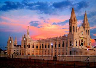 Velankanni the Roman Catholic Latin Rite Basilica is devoted to Our Lady of Good Health. Devotion to Our Lady of Good Health of Velankanni can be traced to the mid-16th century and is attributed to three miracles at sites around where the Basilica stands: the apparition of Mary and the Christ Child to a slumbering shepherd boy, the curing of a lame buttermilk vendor, and the rescue of Portuguese sailors from a violent sea storm. 
