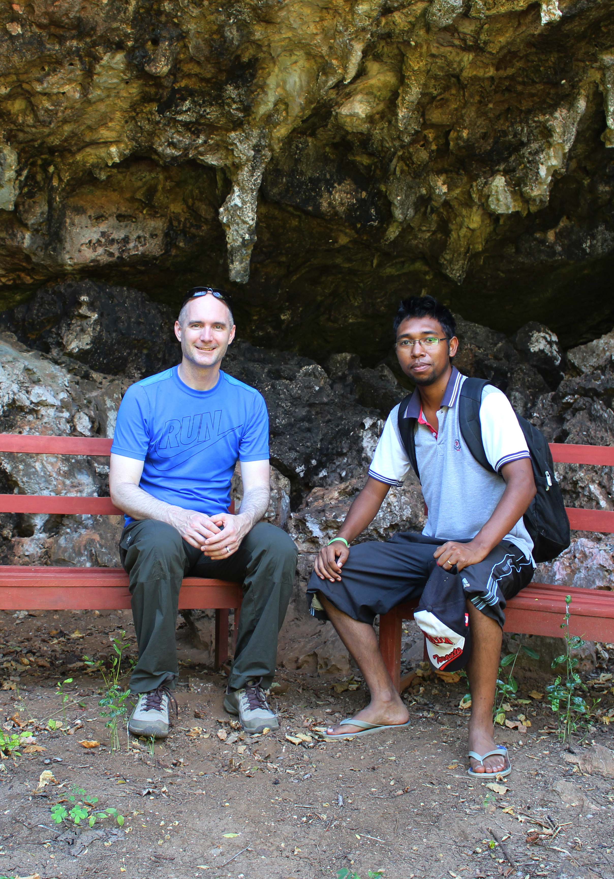  Dr. Perry and graduate student&nbsp;Rindra Rakotoarivony near the Anja rock shelter in northern Madagascar, the archaeological site with the earliest reported evidence of humans on the island. 