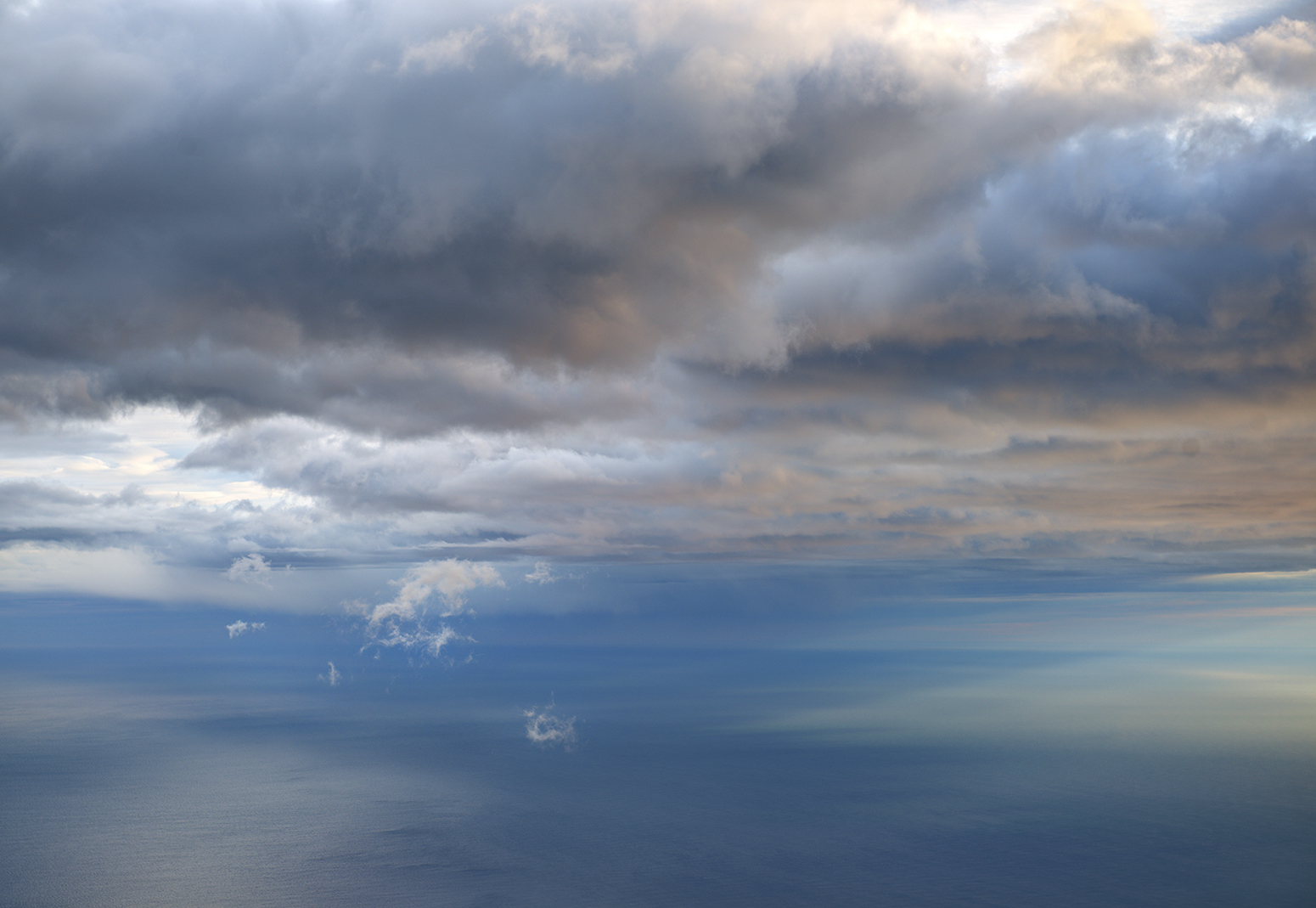 Soft sea and sky from the top of a glacier at 11 pm in Iceland on the wildest photographic night of my life! (Photo Credit: Louise Shoemaker)