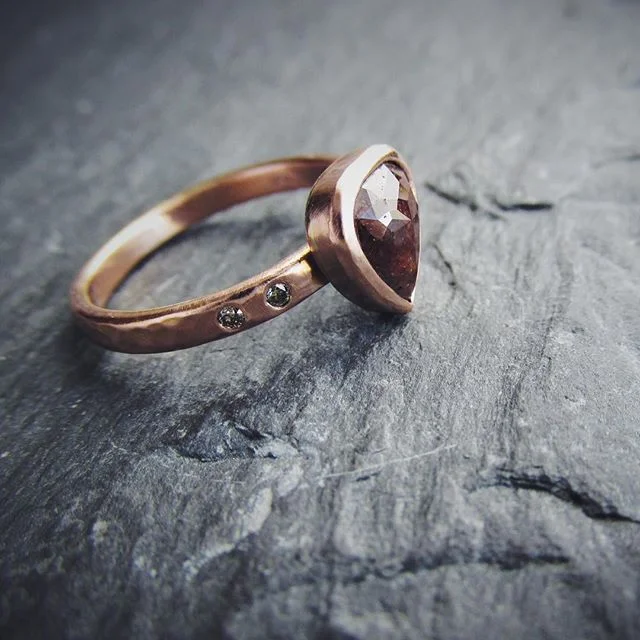 Something a little different from your average diamond engagement ring. A rose cut cognac colored diamond in 14k rose gold with champagne diamonds on the shoulders. The bezel setting gives it an extra special custom-made touch. .
.
.
.
.
.
#cognacdia