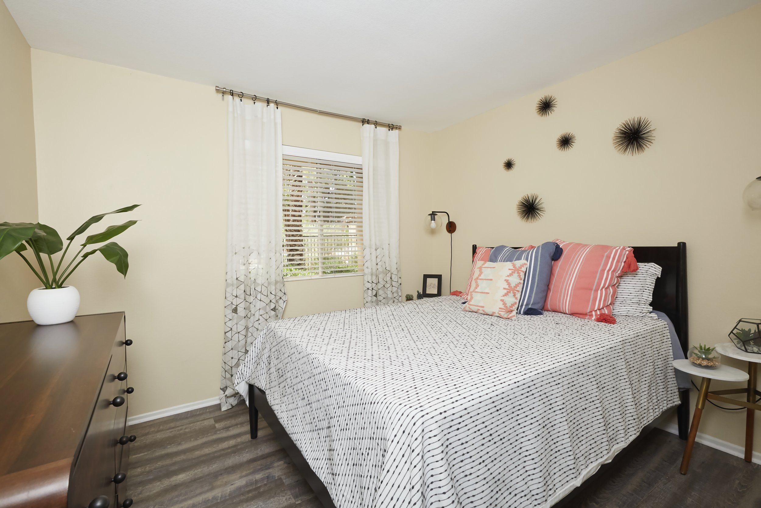  Spacious secondary bedroom with beautiful plank flooring and large window to let natural light in 