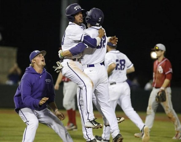 Dane Steinhagen, left, embraces Jeremie Fagnan (Calgary, Alta.) after Fagnan’s game-winning hit in the 10th as the TCU Horned Frogs walked off a win over the Oklahoma Sooners. Photo: Ron T. Ennis, Fort Worth Star-Telegram.