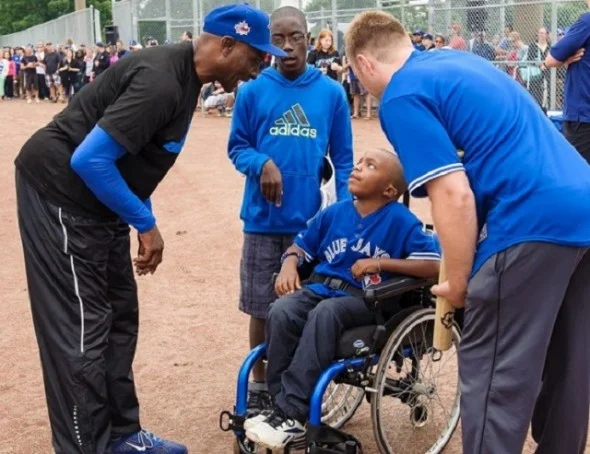 Young Ben throws 1st pitch at opener