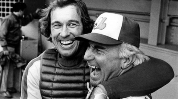 Gary Carter hugs manager Jim Fanning after the Montreal Expos advanced into post-season play.