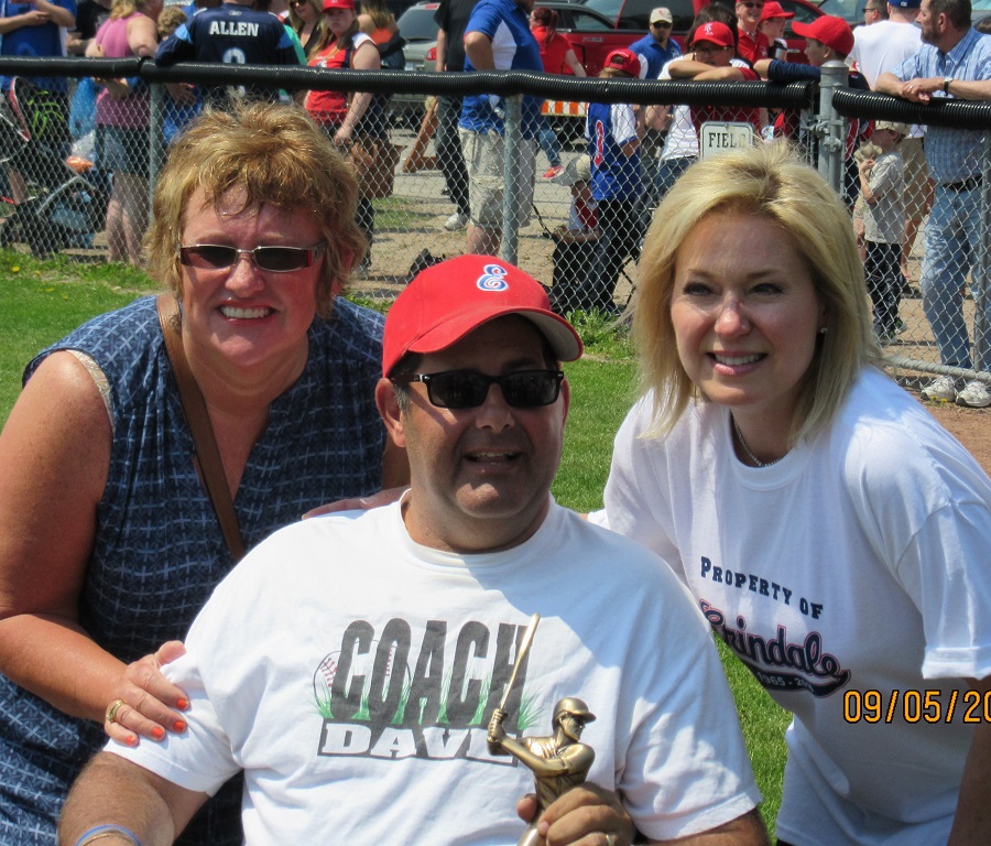 Coach Dave Grier, with his wife Tammy, left, and Mississauga mayor Bonnie Crombie, was presented with the first Dave Grier coaching award on the Erindale Little League association's 50th anniversary. 