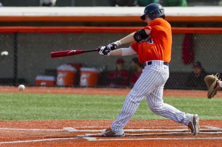Kelly Norris-Jones (4) hits the ball during a Illini 15-4 victory over Mississippi Valley State. Photo: Brent Hofacker