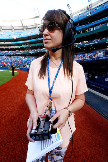 Holly Purdon Gentemann, who has 101 responsiliities with the Blue Jays, runs pre-game on-field ceremonies at the Rogers Centre.