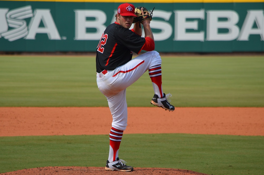 LHP Shane Dawson (Drayton Valley, Alta.), shown here in Cary, NC, worked 5 1/3 scoreless in Canada's first loss of pool play Saturday, a 4-1 setback to the USA. Photo: Alexis Brudnicki.