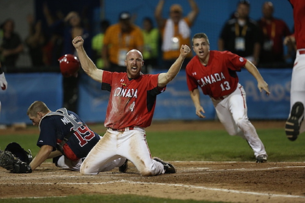 3B Peter Orr arrives safe at home, scoring all the way from first base after two throwing errors and beating a subsequent throw home as Canada won gold in the Pan Am Games Sunday night in Ajax.
