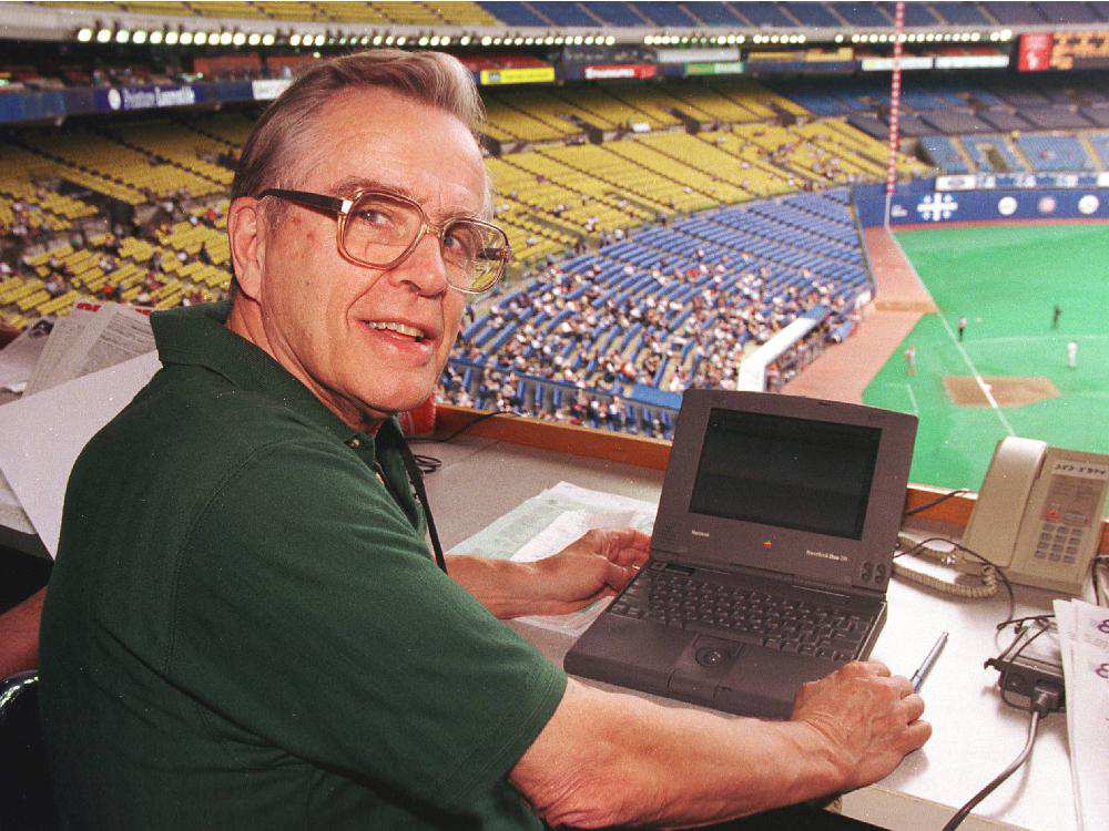 Former Montreal Gazette sportswriter Ian MacDonald as his regular seat in the Olympic Stadium press box. Photo: Andre Pichette/Montreal Gazette.