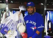 Edwin Encarnacion hit his third home run and suddenly the Rogers Centre crowd littered the warning track with ball caps.