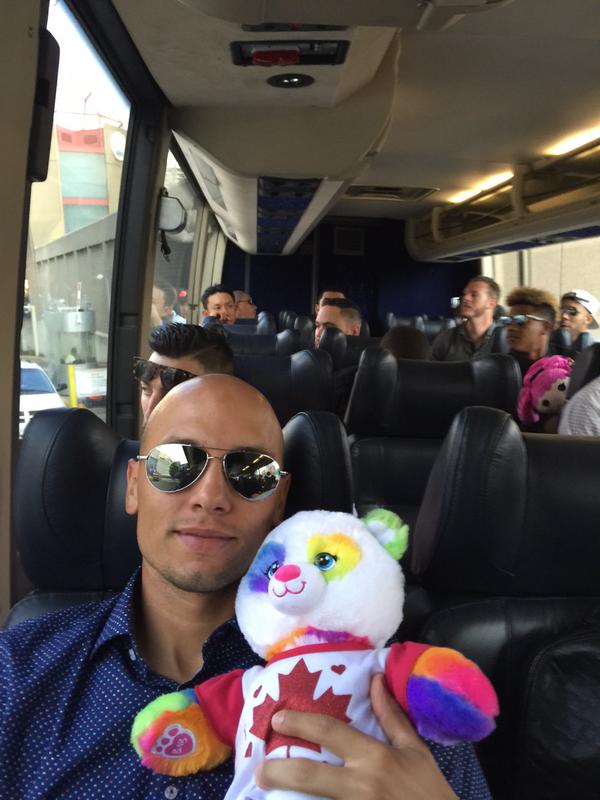 2B Ryan Goins and his bear buddy on the Blue Jays bus.