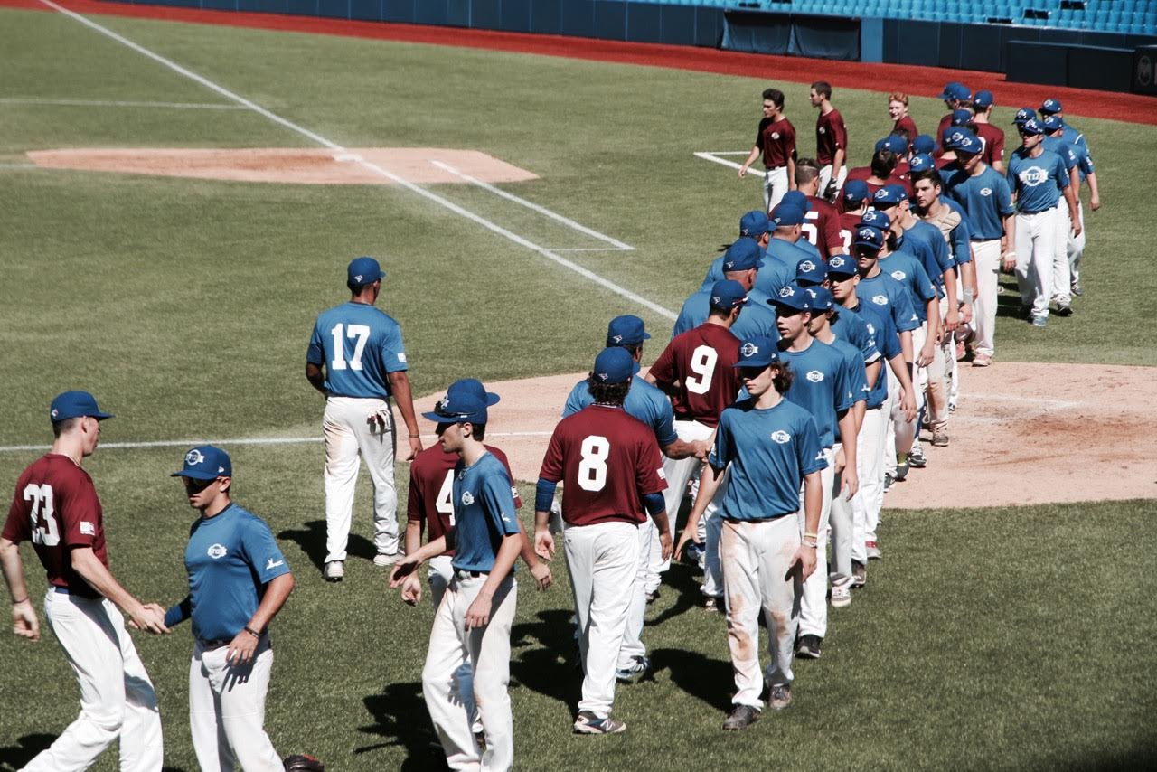 Atlantic Maroon and Quebec Blue shake hands after their game. Photo: Tyler King.