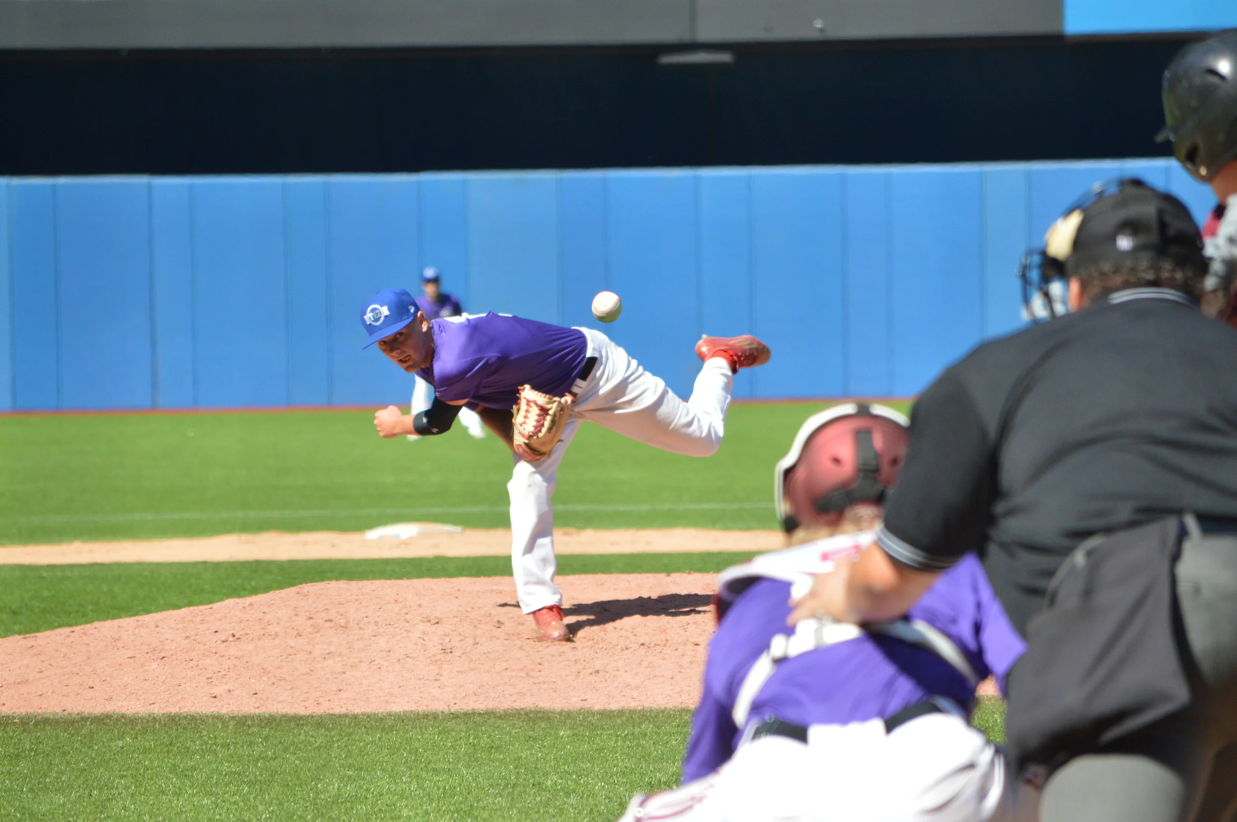 Prairies Purple starter Brody Frerichs (Muenster, Sask.) of the Meunster Red Sox, finishes his delivery against Atlantic Maroon. Photo Credit: George Redak