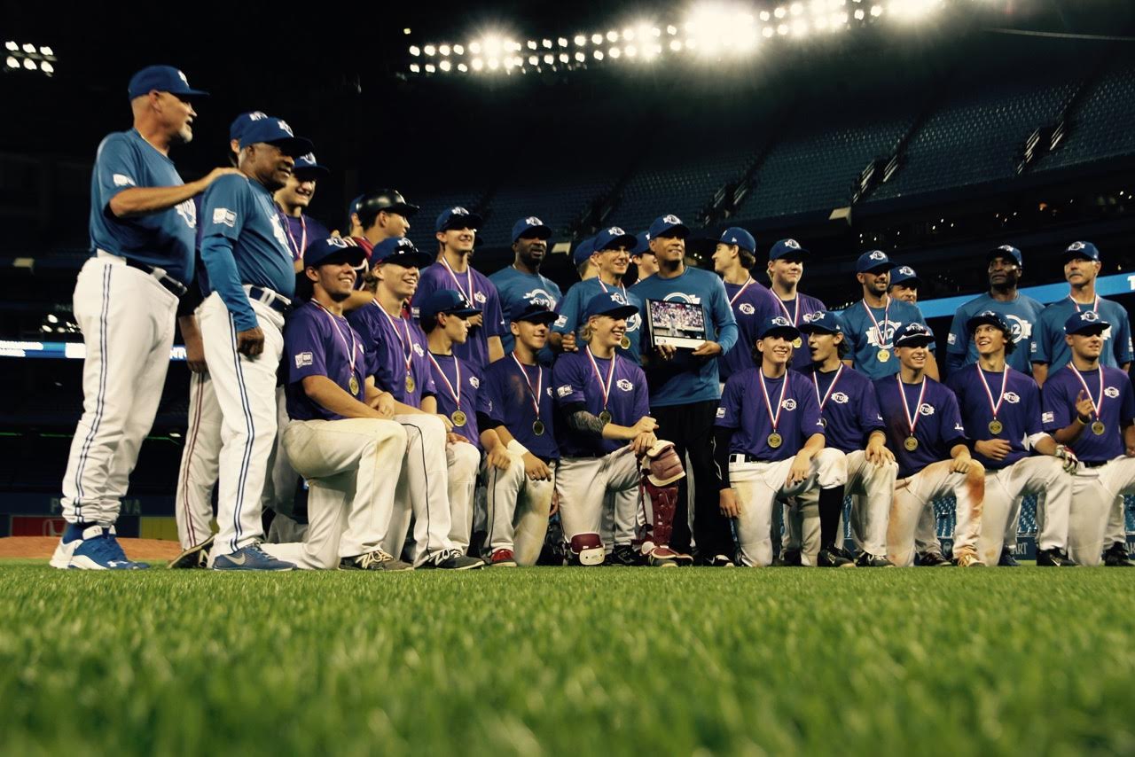 Prairies Purple champions pose with commisioner Robbie Alomar and the alumni who took part in the five-day Tournament 12. Photo: Tyler King.
