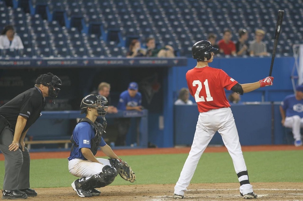 1B Soren Graversen (Calgary, Alta.) No. 21 with Alberta Red in Tournament 12, and the Okotoks Dawgs is one of the newcomers invited to the Canadian Junior National Team camp next week. Photo: Tyler King.