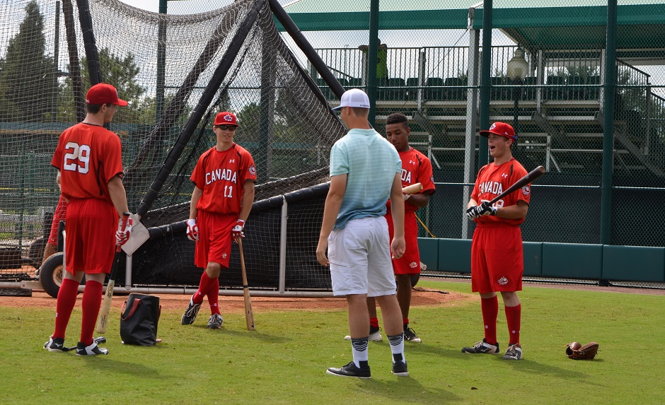 Atlanta Braves RHP Mike Soroka (blue) chats with members of the Junior National Team after pitching two scoreless inning. Photo: Alexis Brudnicki.