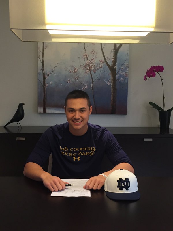 Andrew Yerzy poses with his Notre Dame Fighting Irish gear. (Source: Twitter)