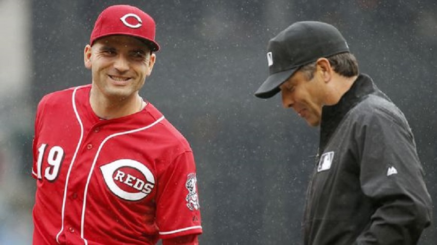 Cincinnati Reds 1B Joey Votto (Etobicoke, Ont.) a former Etobicoke Ranger talks with umpire James Hoye.
