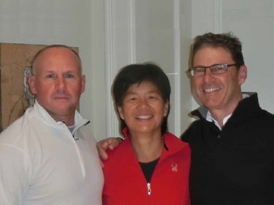 Nicole Tevlin centre and husband Mike Tevlin purchased 50% of The Baseball Zone to partner with Rick Johnston.